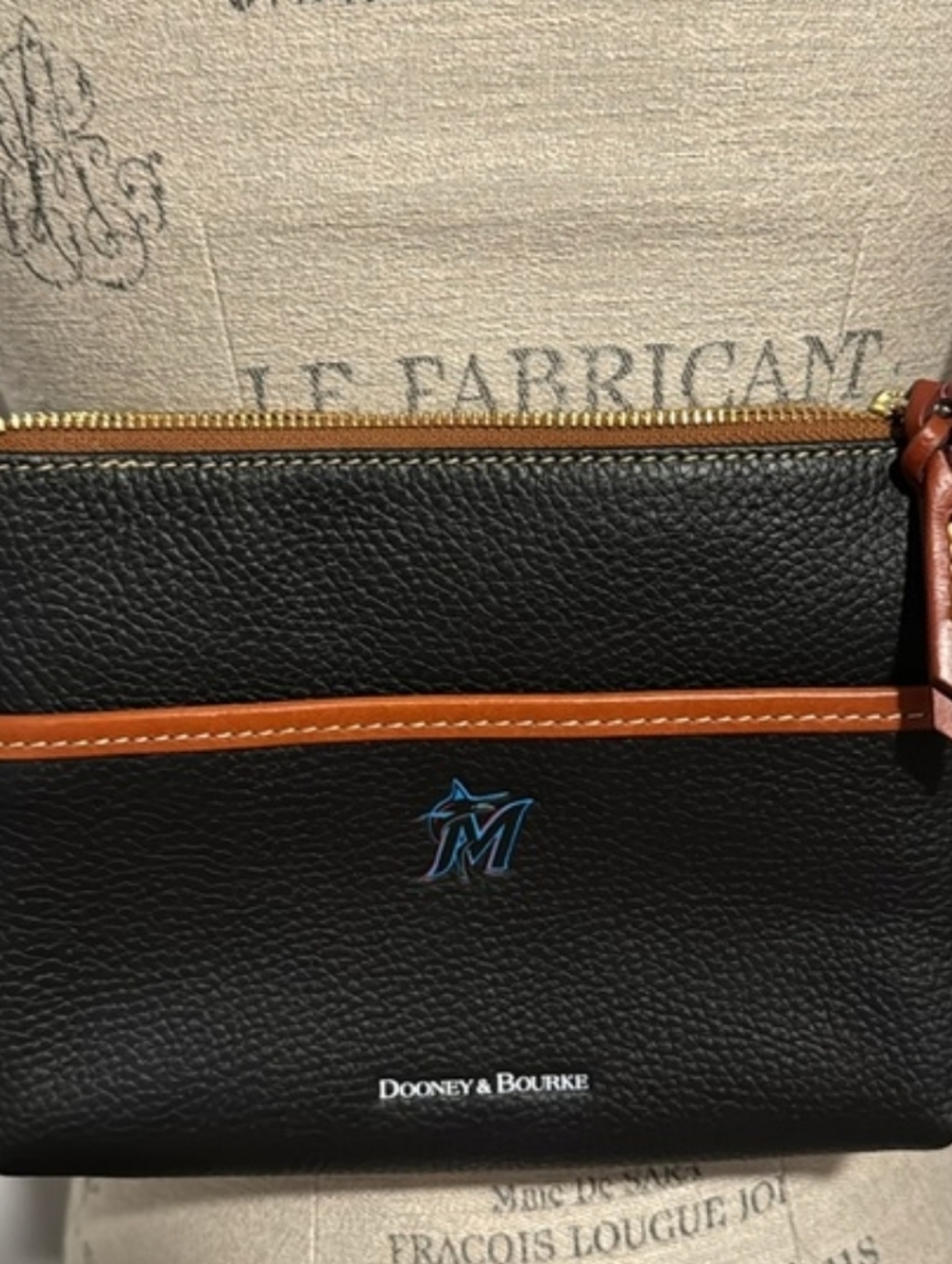 Dooney & Bourke Black and Tan Leather Crossbody w/ Miami Marlins Emblem